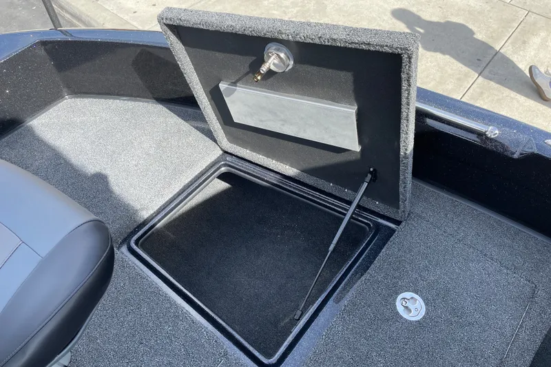 Slide: The Image of Open storage compartment in 2027 Nitro ZV19 Sport boat, showcasing interior design. - 24
