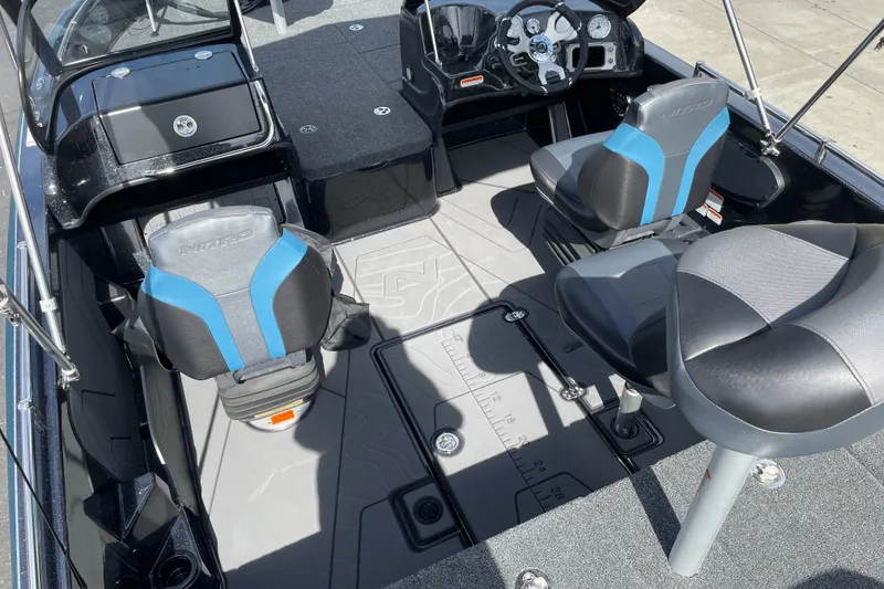Slide: The Image of Interior of 2027 Nitro ZV19 Sport boat with modern seating and dashboard. - 33