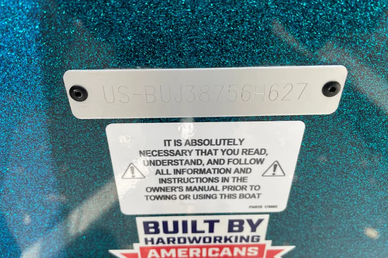 Slide: The Image of 2027 Nitro ZV19 Sport boat identification plate with safety instructions and manufacturing label. - 36