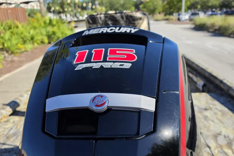 Slide: The Image of Mercury 115 Pro outboard motor on 2027 Ranger RB190 boat, outdoor setting. - 14