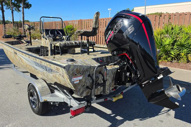 Slide: The Image of 2027 Ranger RB190 boat with powerful outboard motor on a trailer. - 13