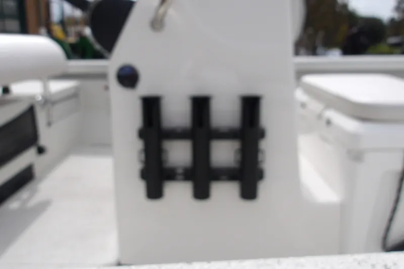 Slide: The Image of Blurry interior of a 2027 Ranger RB200 boat with rod holders. - 7