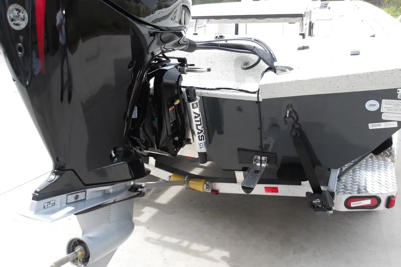 Slide: The Image of Rear view of a 2027 Ranger RB200 boat on a trailer, showcasing the motor and hull. - 5