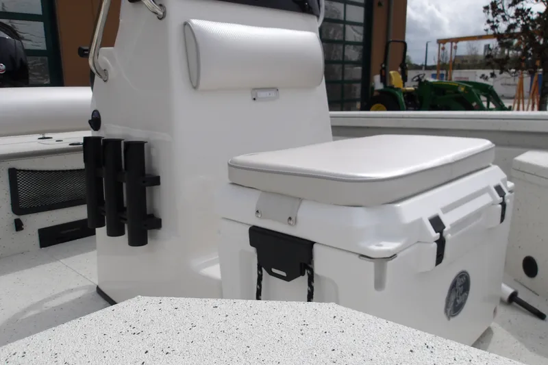 Slide: The Image of 2027 Ranger RB200 boat interior with cushioned seating and rod holders. - 9
