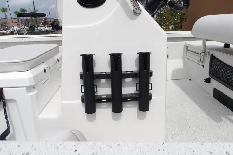 Slide: The Image of 2027 Ranger RB200 boat interior with rod holders and seating. - 16