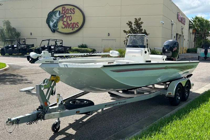Slide: The Image of 2027 Ranger RB200 boat on trailer outside Bass Pro Shops store. - 4