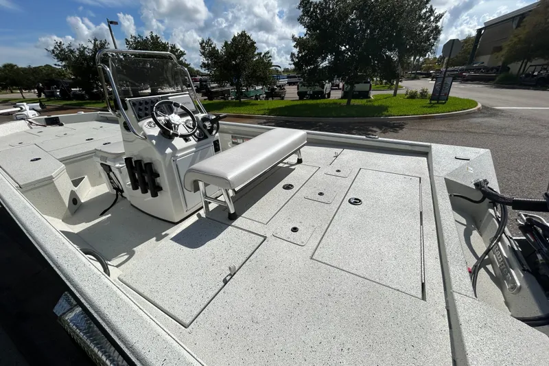 Slide: The Image of 2027 Ranger RB200 boat with sleek design, spacious deck, and modern console under a sunny sky. - 9
