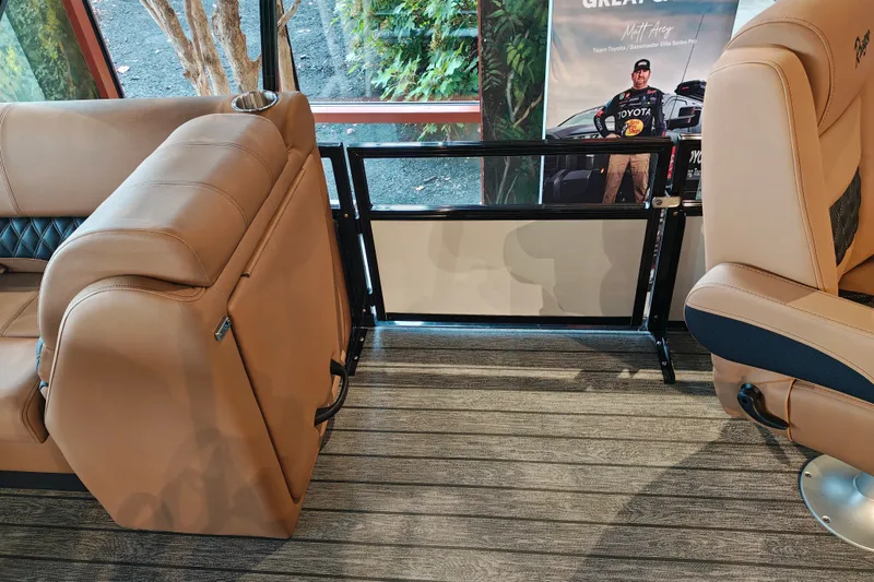 Slide: The Image of Interior of 2027 Ranger 220FC boat with tan seating and modern design. - 37