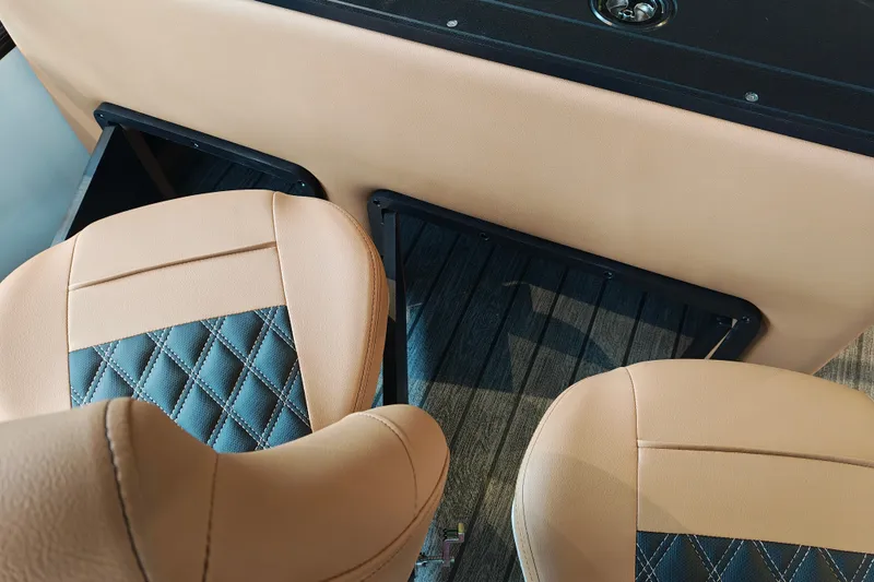 Slide: The Image of Luxurious seating in 2027 Ranger 220FC boat with diamond-stitched upholstery. - 49