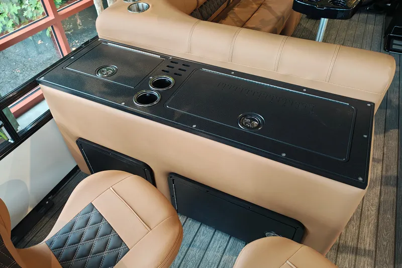 Slide: The Image of Luxurious interior of 2027 Ranger 220FC with tan seating and sleek black console. - 46