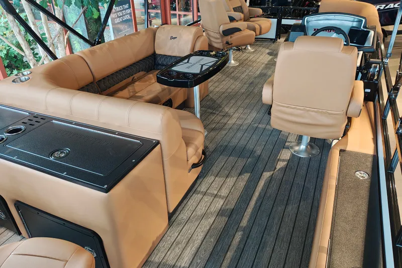 Slide: The Image of Luxurious interior of 2027 Ranger 220FC boat with tan seating and modern amenities. - 58