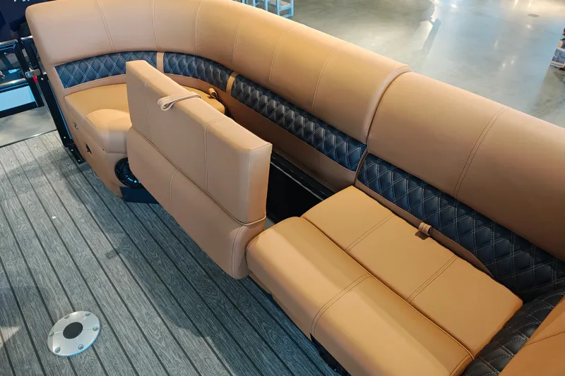Slide: The Image of Luxurious seating on 2027 Ranger 220FC boat with tan and black upholstery. - 13