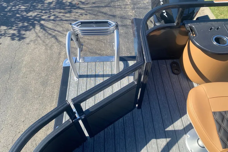 Slide: The Image of Ranger 223F 2027 boat deck with ladder and seating, featuring modern design elements. - 13