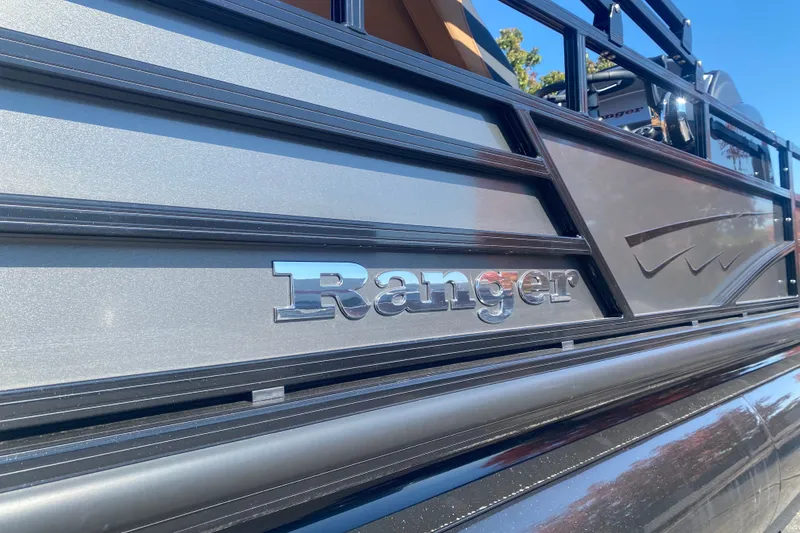 Slide: The Image of 2027 Ranger 223F boat side view with logo and sleek design. - 2