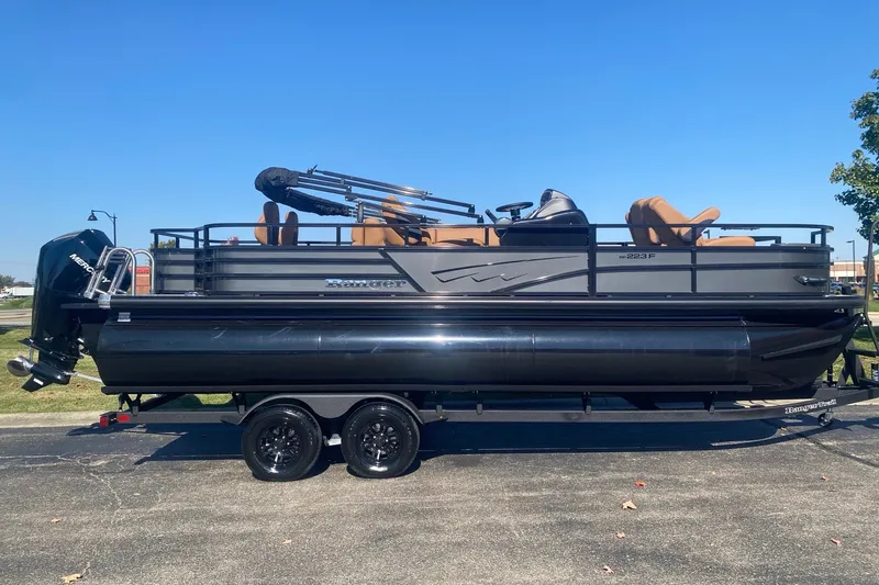 Slide: The Image of 2027 Ranger 223F pontoon boat with sleek design and comfortable seating. - 1