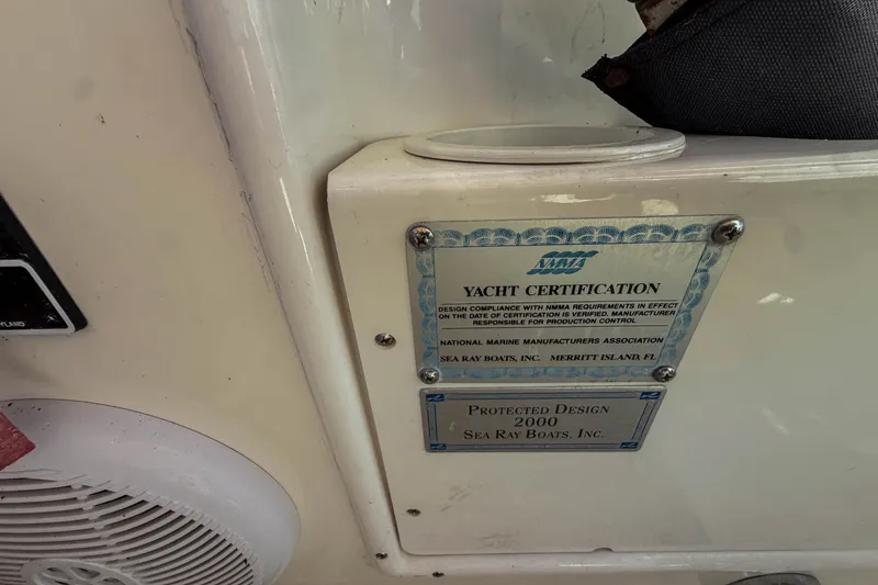 Slide: The Image of Yacht certification plaque on 2003 Sea Ray 410 Sundancer, showcasing NMMA compliance. - 27