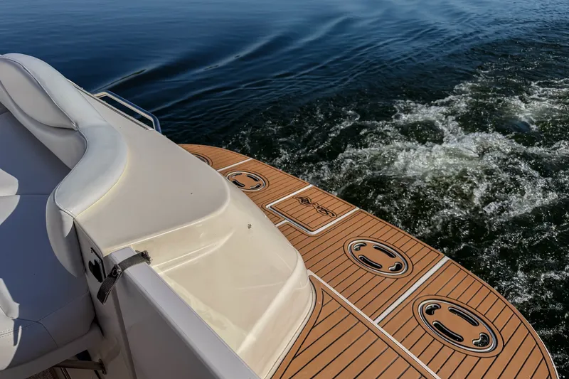 Slide: The Image of 2003 Sea Ray 410 Sundancer boat deck with water view. - 18
