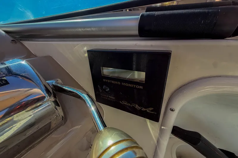 Slide: The Image of Control panel of a 2003 Sea Ray 410 Sundancer boat with systems monitor. - 26