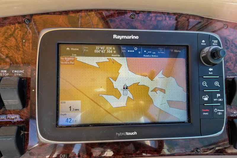 Slide: The Image of Raymarine GPS display on 2003 Sea Ray 410 Sundancer showing navigation map. - 25