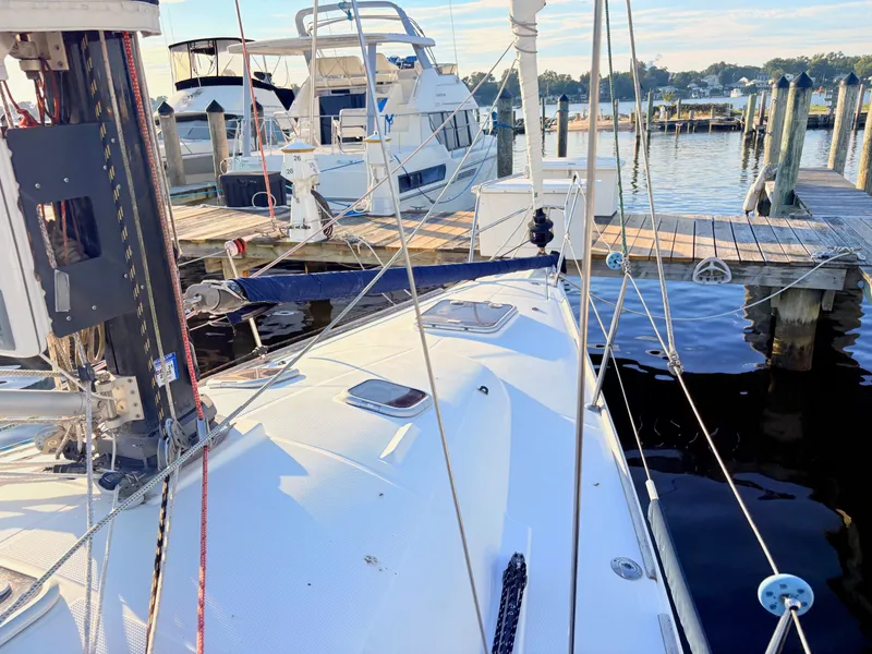 Slide: The Image of The image shows the deck of a 2007 Beneteau First 36.7 docked at a marina. - 25