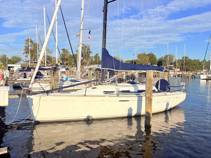 Slide: The Image of 2007 Beneteau First 36.7 sailboat docked in a marina. - 2