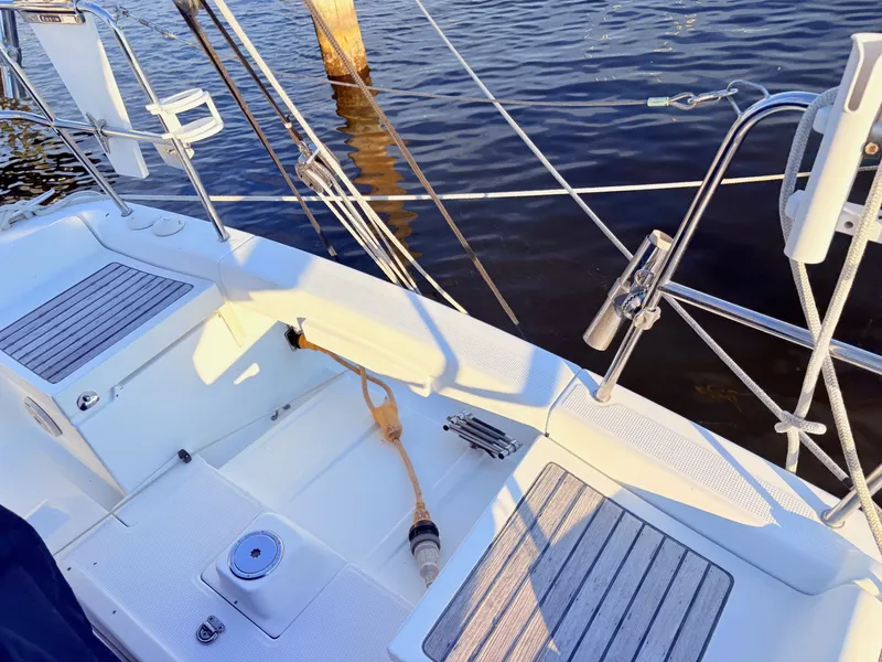Slide: The Image of The cockpit of a 2007 Beneteau First 36.7 with a clean deck and wooden details. - 30