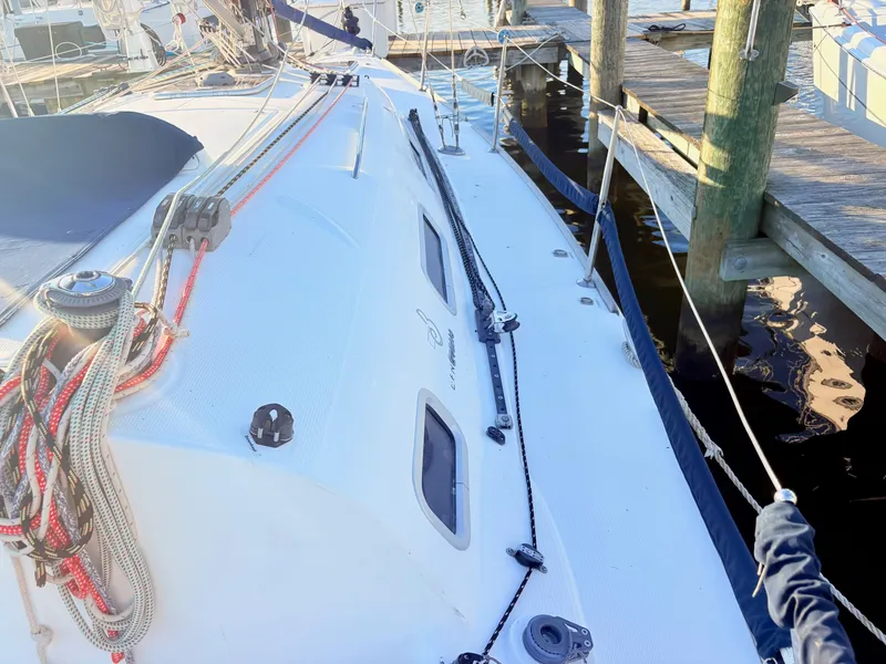 Slide: The Image of The image shows the deck of a 2007 Beneteau First 36.7 at a dock. - 24