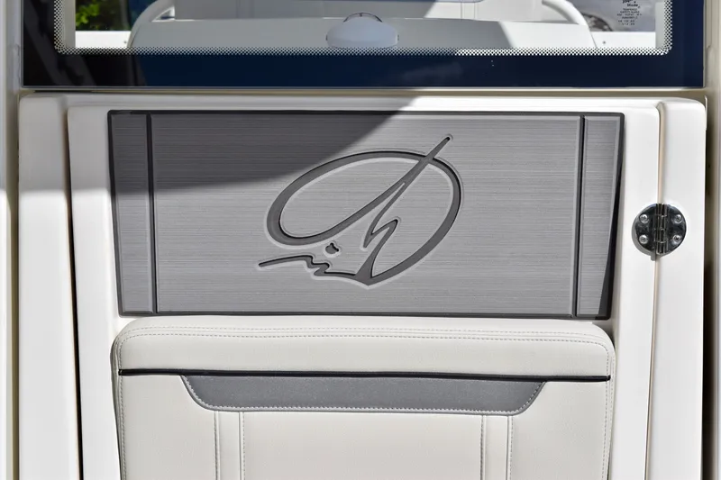 Slide: The Image of 2027 Sailfish 252 CC boat interior detail with sleek design and logo. - 17