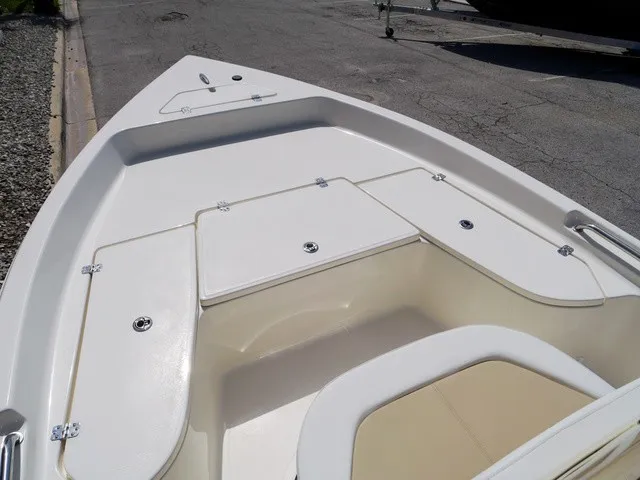 Slide: The Image of The image shows the deck of a 2027 Bulls Bay 2000 boat with storage hatches. - 24