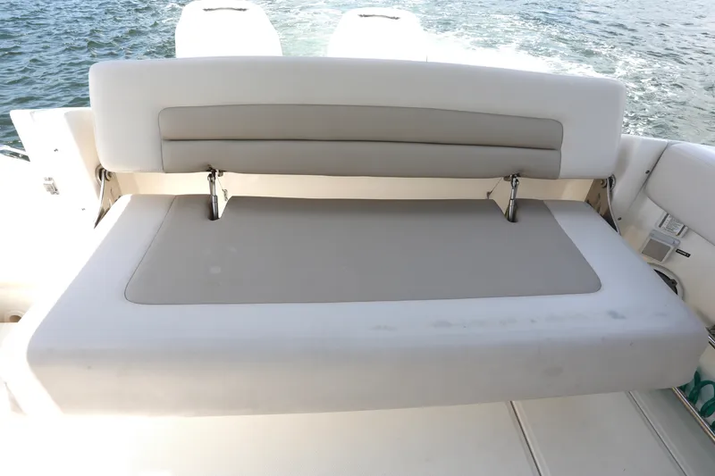 Slide: The Image of 2016 Boston Whaler 320 Vantage boat seat with ocean backdrop. - 23