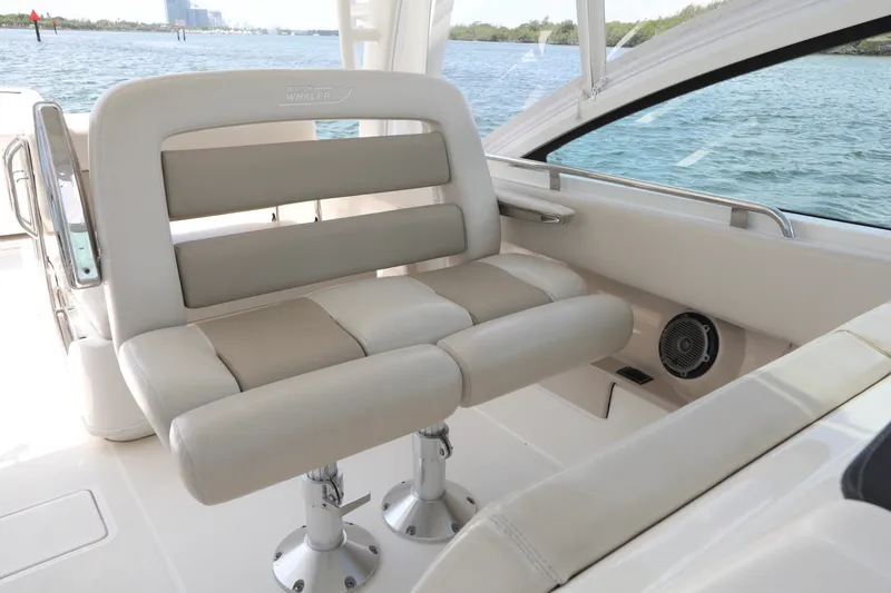 Slide: The Image of 2016 Boston Whaler 320 Vantage interior seating with ocean view. - 18