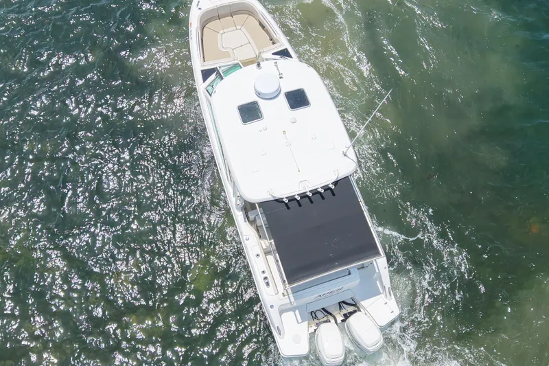 Slide: The Image of Aerial view of 2016 Boston Whaler 320 Vantage boat cruising on water. - 3