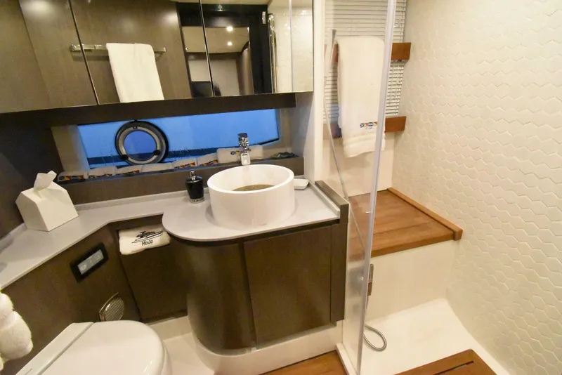 Slide: The Image of Luxurious bathroom in 2024 OKEAN 52 yacht with modern fixtures and elegant design. - 12