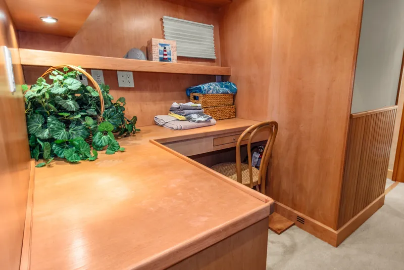 Slide: The Image of Cozy workspace on 2006 Solander Eclipse Steel Trawler with wooden desk and chair. - 38