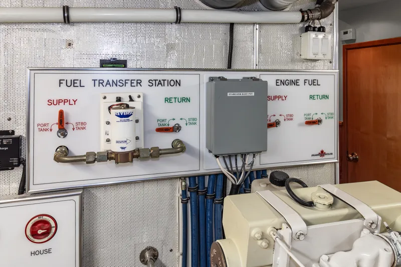 Slide: The Image of Fuel transfer station on 2006 Solander Eclipse Steel Trawler, showing supply and return controls. - 44