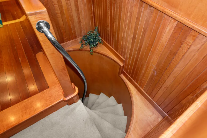 Slide: The Image of Wooden spiral staircase on 2006 Solander Eclipse Steel Trawler yacht interior. - 22