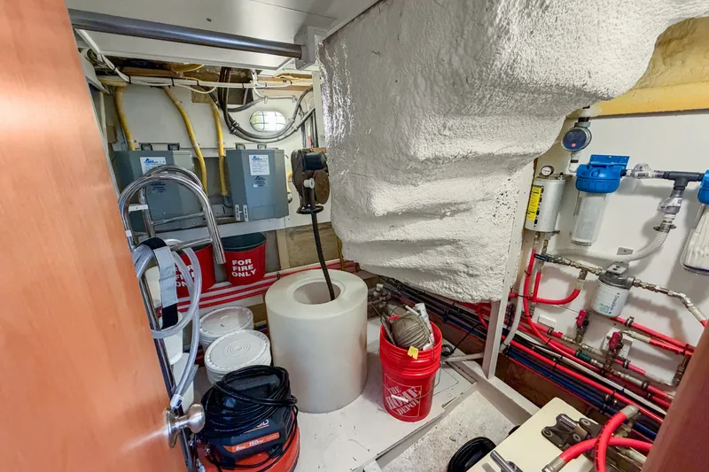 Slide: The Image of Engine room of 2006 Solander Eclipse Steel Trawler with equipment and safety gear. - 46