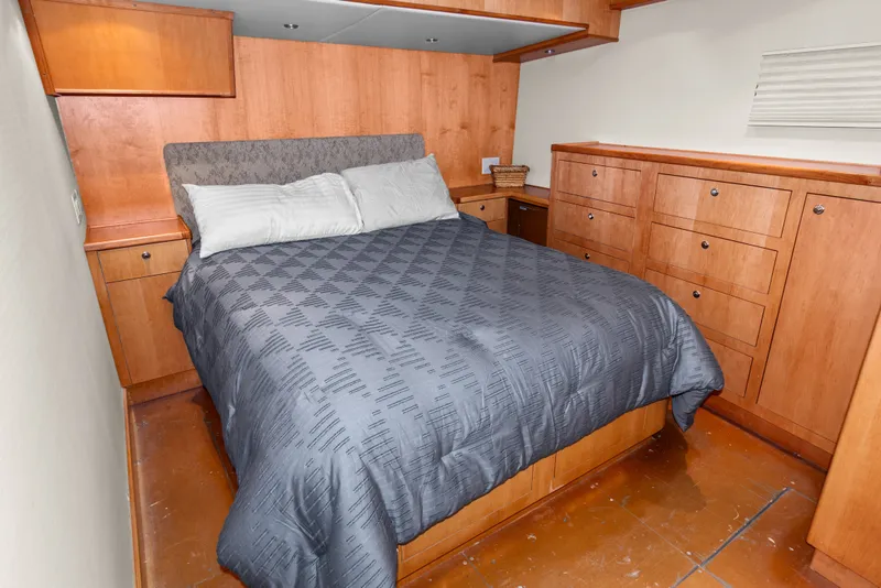 Slide: The Image of Cozy bedroom with wooden cabinetry on 2006 Solander Eclipse Steel Trawler. - 28