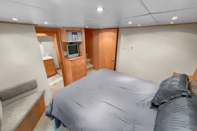 Slide: The Image of Luxurious bedroom interior of 2006 Solander Eclipse Steel Trawler with modern amenities and cozy design. - 33