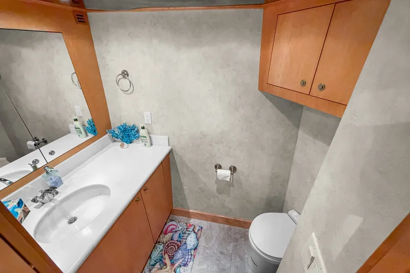 Slide: The Image of Bathroom interior of 2006 Solander Eclipse Steel Trawler with wooden cabinets and modern fixtures. - 40