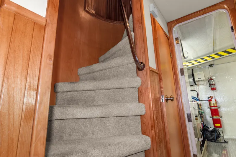 Slide: The Image of Carpeted stairs and engine room in 2006 Solander Eclipse Steel Trawler interior. - 24