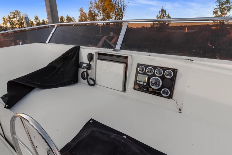 Slide: The Image of Control panel of 2006 Solander Eclipse Steel Trawler with gauges and radio equipment. - 55