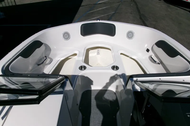 Slide: The Image of 2022 Bayliner VR6 Bowrider OB interior with spacious seating and modern design. - 5