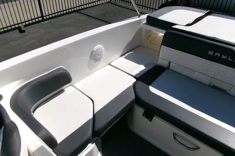 Slide: The Image of 2022 Bayliner VR6 Bowrider OB interior seating with sleek design and comfortable cushions. - 16