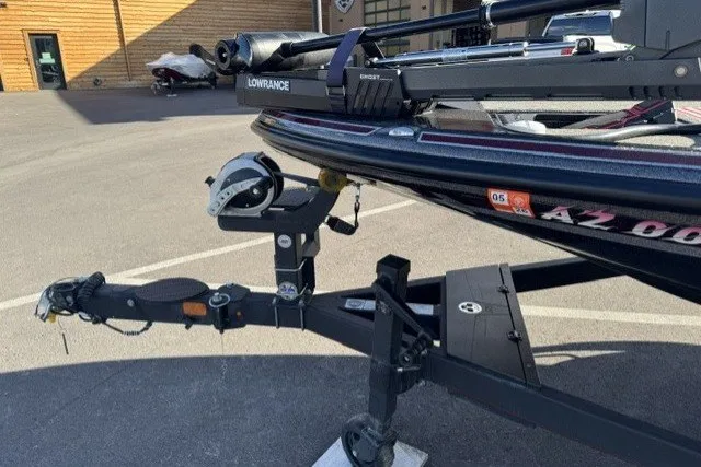 Slide: The Image of 2024 Nitro Z21 XL Pro boat trailer with Lowrance equipment in a parking lot. - 5