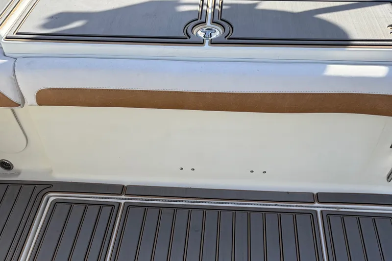 Slide: The Image of 2005 Hydra-Sports Vector 3300 VX boat deck with cushioned seating and non-slip flooring. - 5