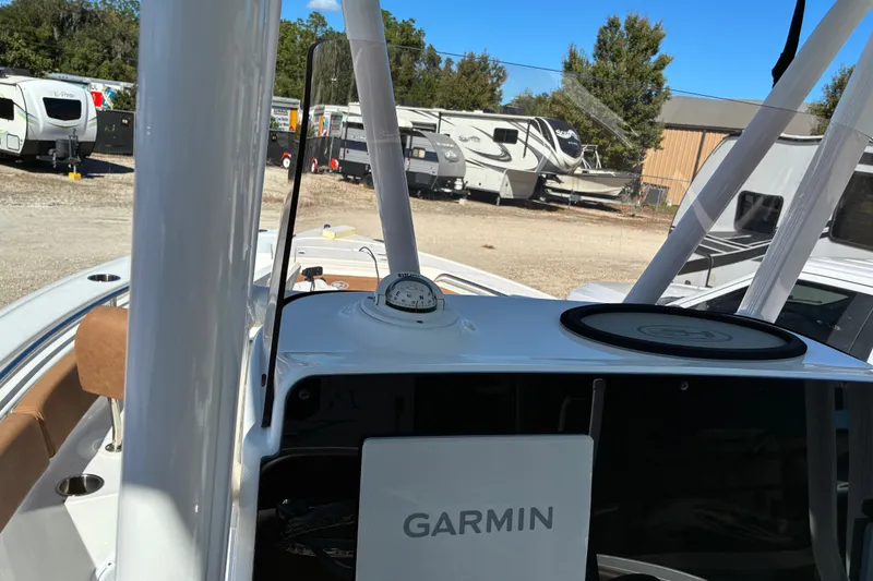 Slide: The Image of 2023 Sea Hunt Ultra 229 boat dashboard with Garmin navigation system. - 43