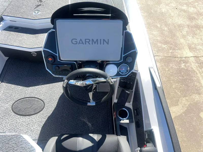 Slide: The Image of The image shows the cockpit of a Vexus VXs21 boat with a large Garmin display. - 15