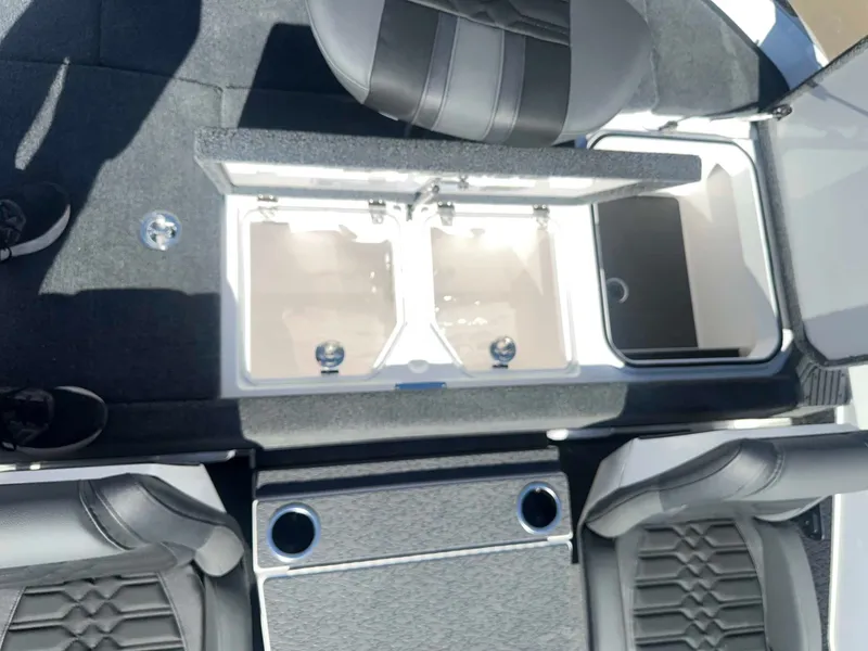Slide: The Image of Interior view of a 2027 Vexus VXs21 with seating and storage compartments. - 11
