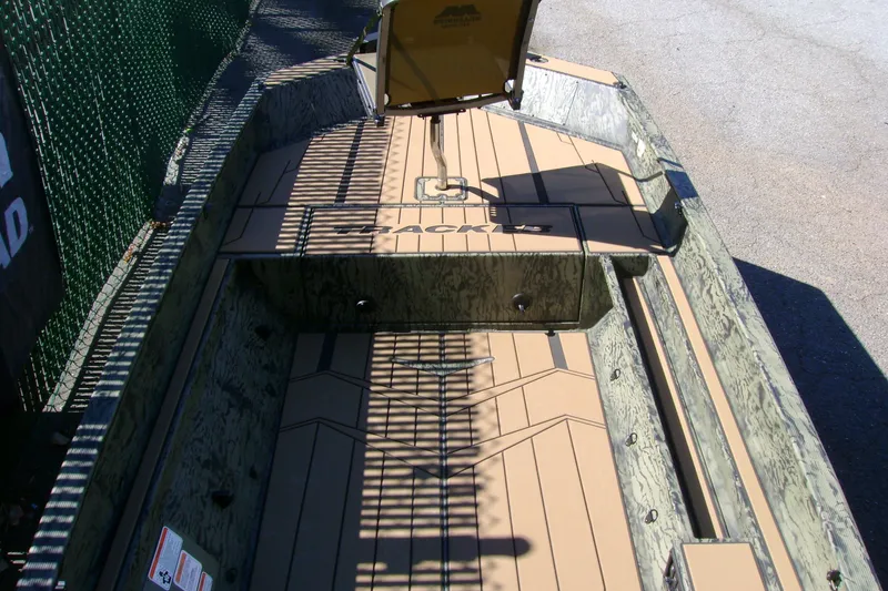 Slide: The Image of Interior view of 2027 Tracker Grizzly 1553 Timber boat with camouflage design. - 45